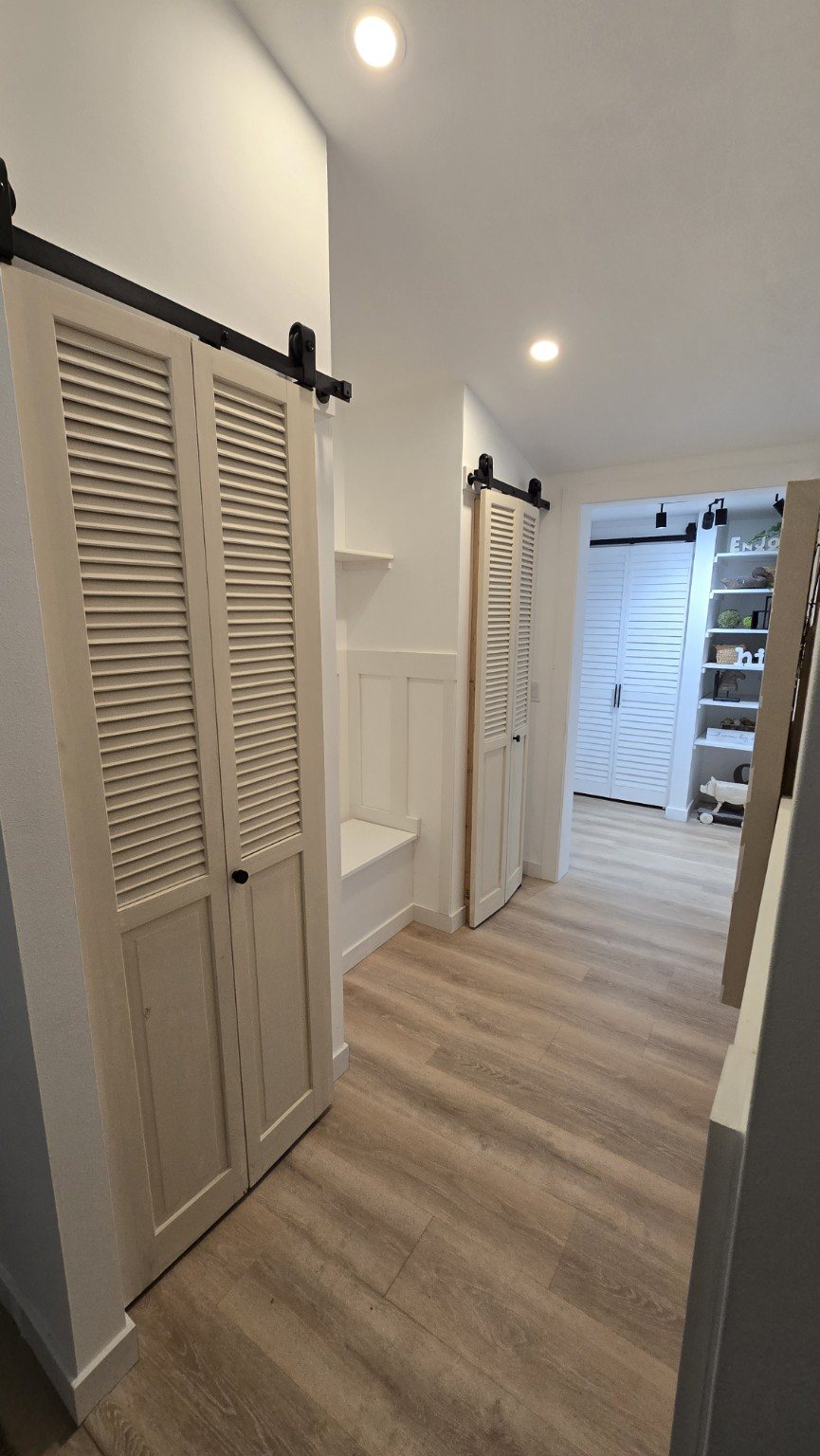 Interior barn doors and hallway trim