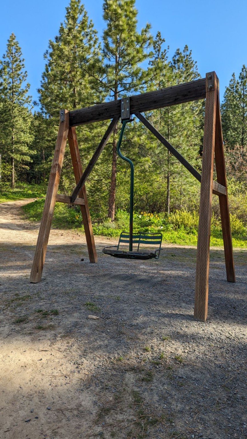 Custom chairlift swing in forest setting