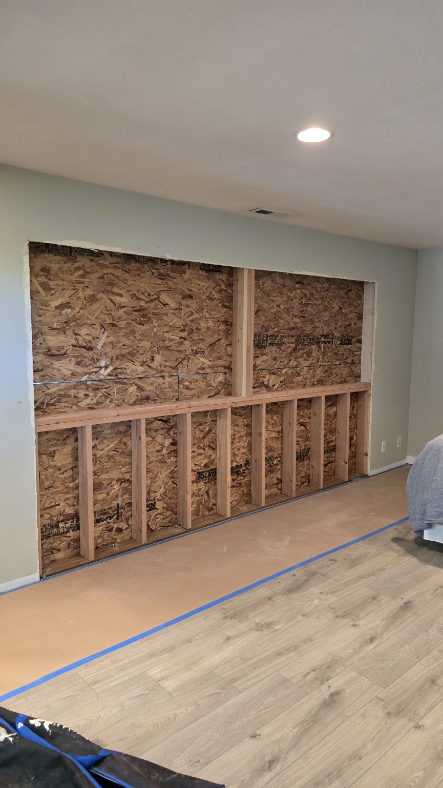 Interior wall framing and structural modifications in progress